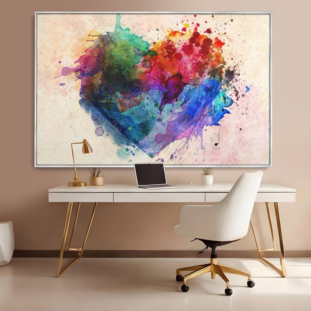Tablou canvas cu tablou canvas cu inima colorata, in rama de aluminiu argintiu, pe perete intr-un birou